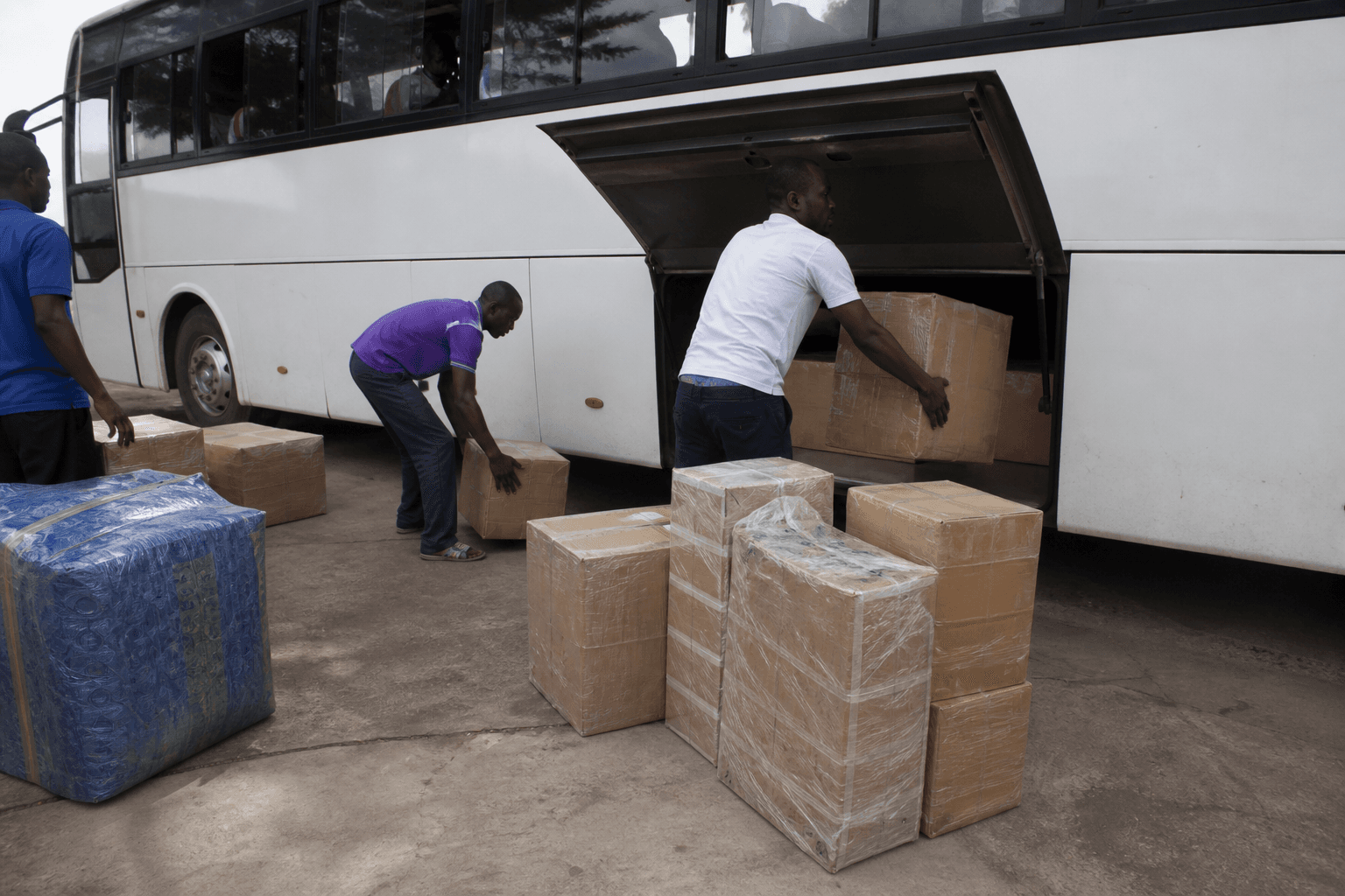 Parcels loaded into the bus luggage bay